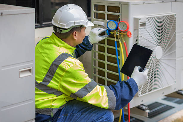 Professional Hvac technician working in Morrisonville, IL